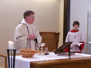 Fr. John presides at the Altar during the Great Thanksgiving.