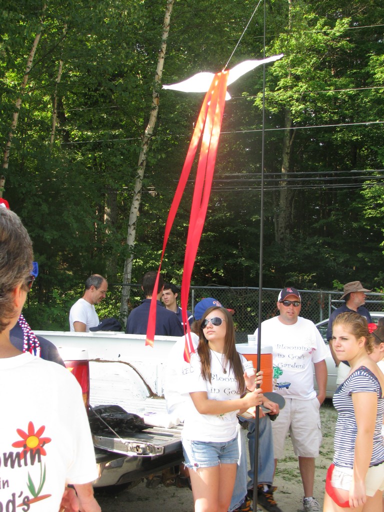 Brianna was in charge of the pole flying the Holy Spirit dove at the head of the line.