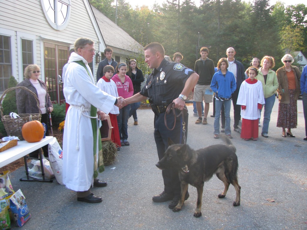 Officer Kelly and the new Weare K9 dog were a special hit at the blessing. The dog, presently just designated 26, showed a special interest in Tom Beland's rabbits. So criminal bunnies better watch out around Weare!